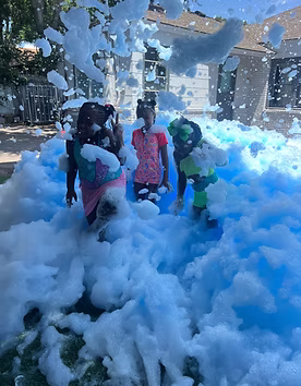 Kids enjoying a foam party moment 2